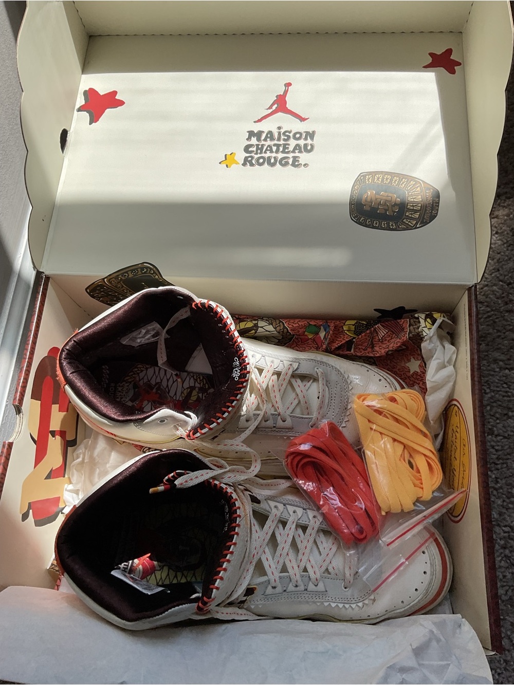Nike Air Jordan White and Orange United Youth International High-Top Sneakers